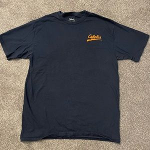 Cabelas mens size: medium t shirt with deer/gun logo